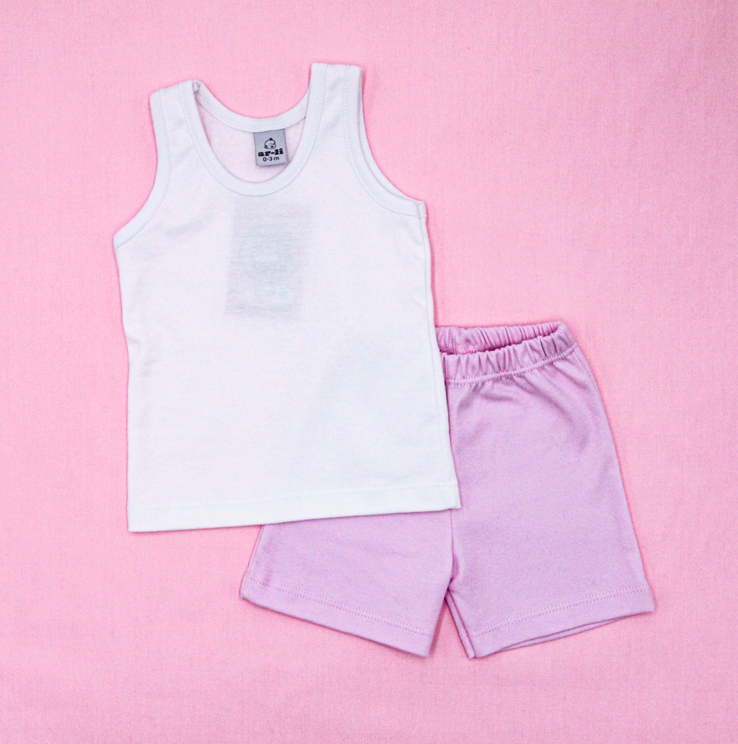 CONJUNTO BIVIDI BLANCO C/ SHORT ROSADO