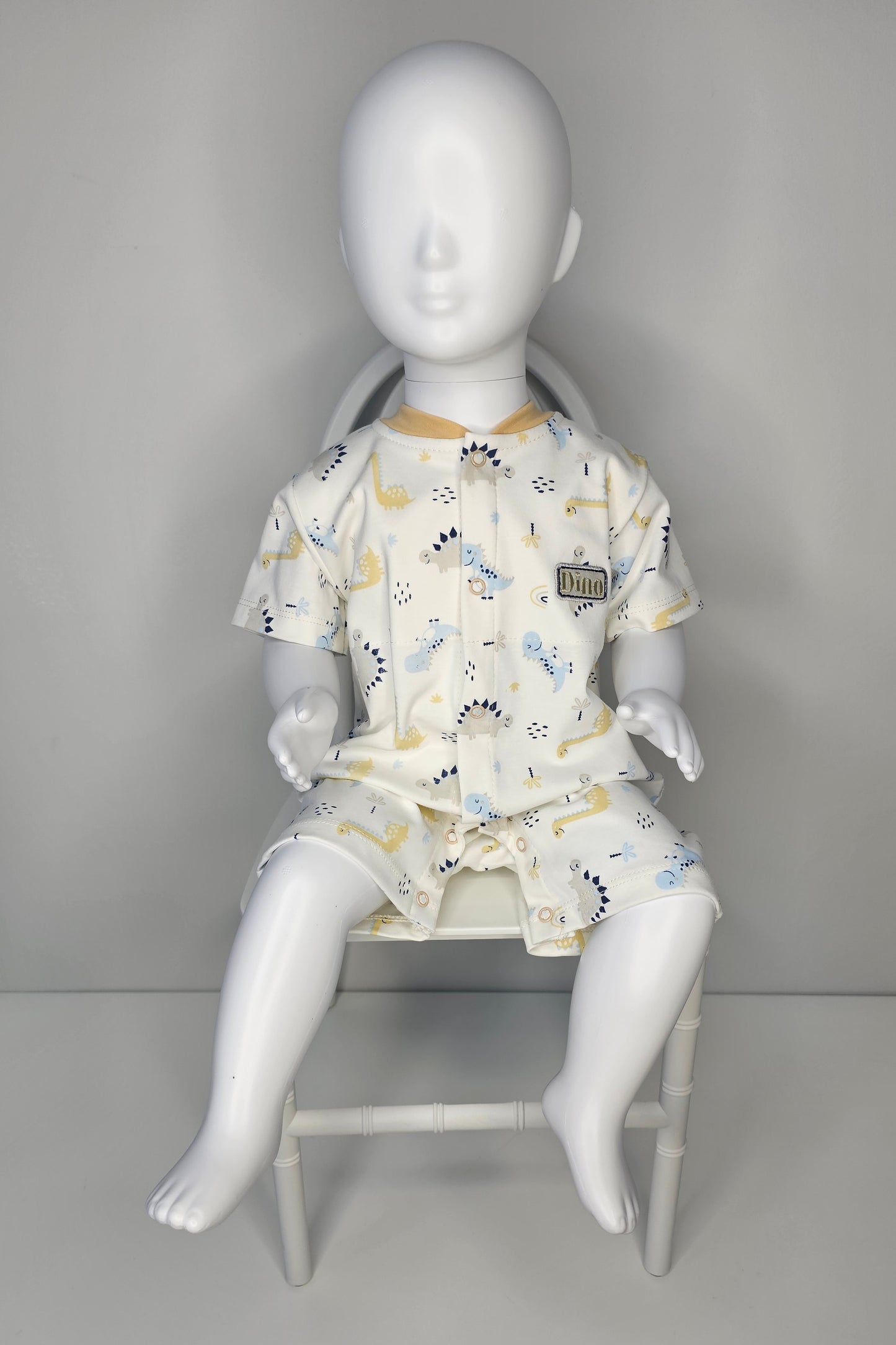 ENTERIZO DINO REX EN COLOR BEIGE