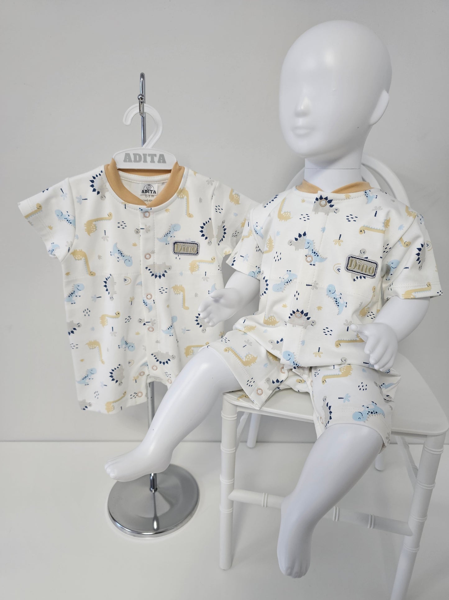 ENTERIZO DINO REX EN COLOR BEIGE