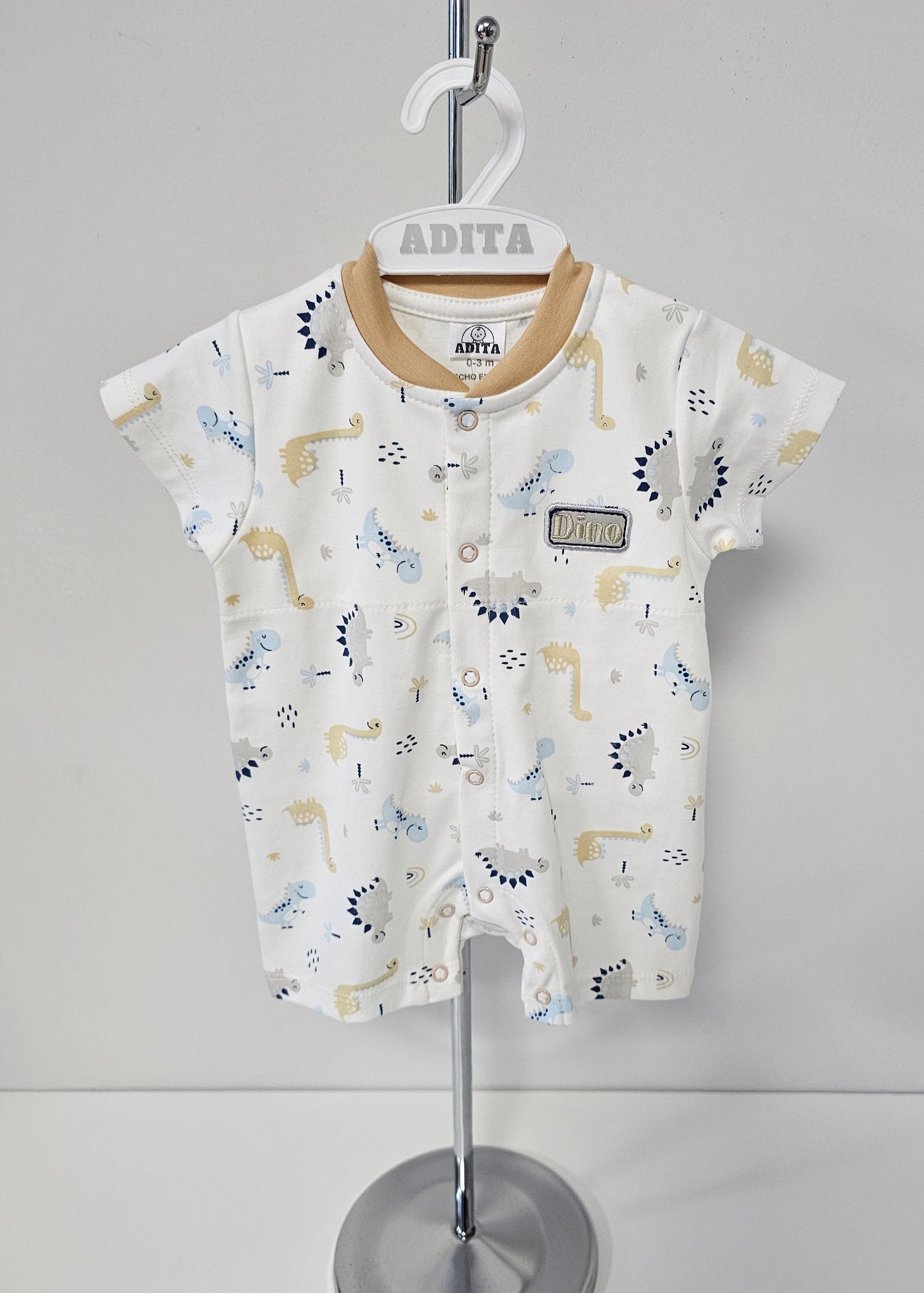 ENTERIZO DINO REX EN COLOR BEIGE